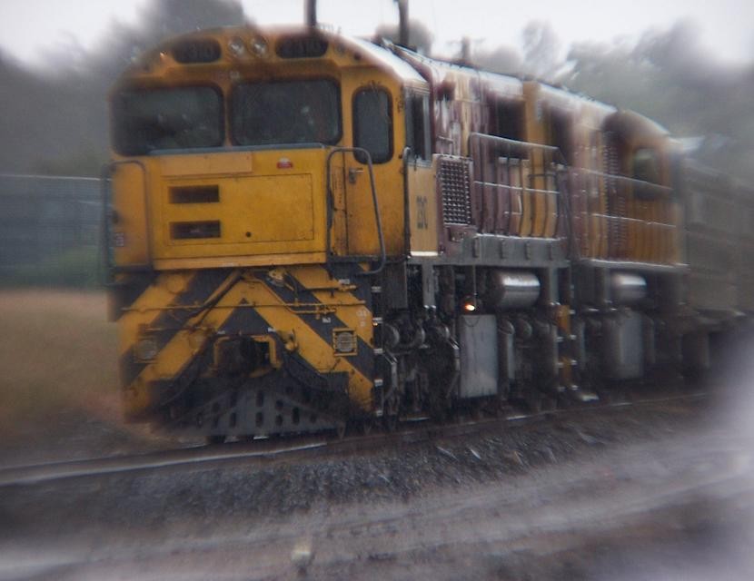 Photo of Aurizon 2310/2362 Arriving In A Pouring Storm.