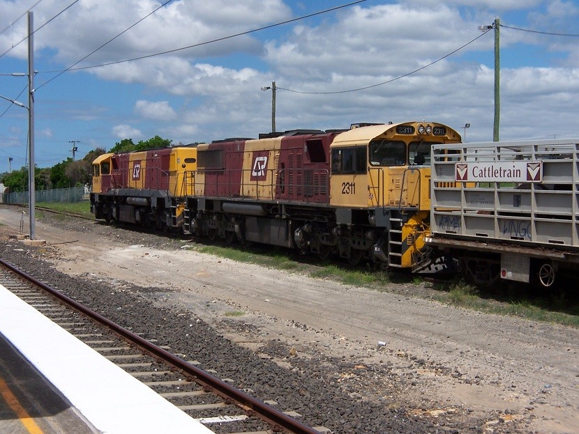 Photo of QR/AURIZON 2490/2311 Seen Arriving With A Solid Load.