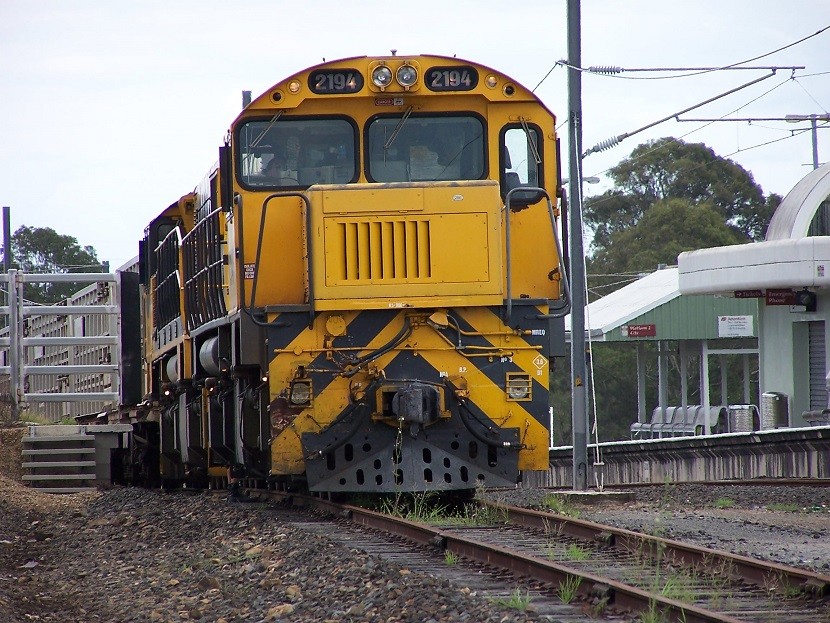 Photo of QR/AURIZON 2194/2484 About To Unload Beef.