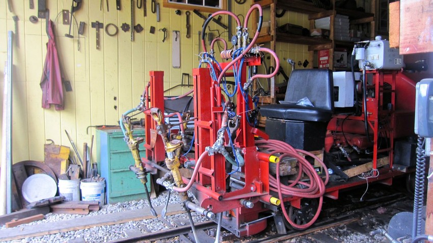 Photo of side view of the tamper machine