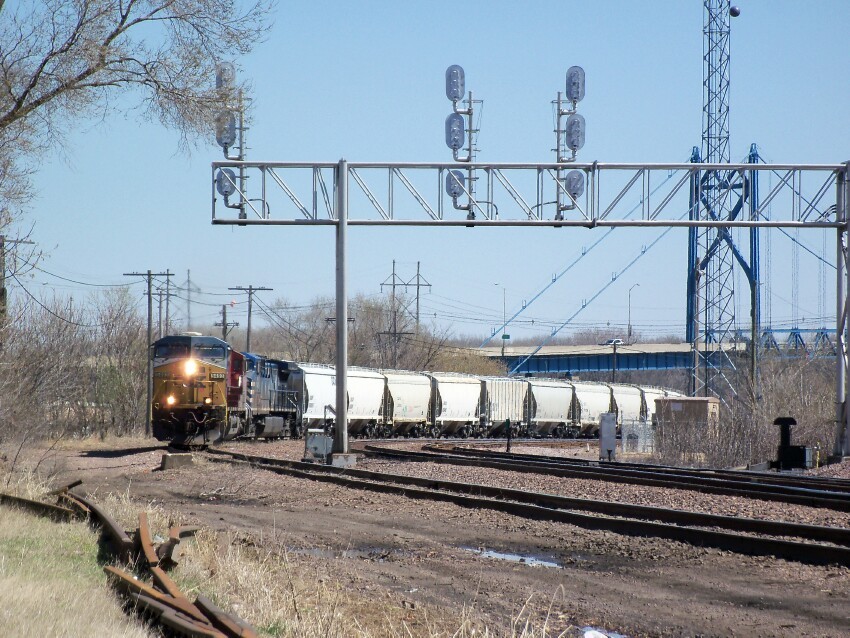 Photo of CSX, Canadian Pacific, and CEFX Engines Going Through Clinton, IA