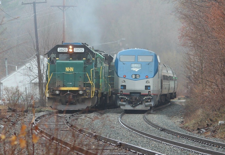 Photo of The Downeaster passes a Late Running BODO on a Foggy April Morning