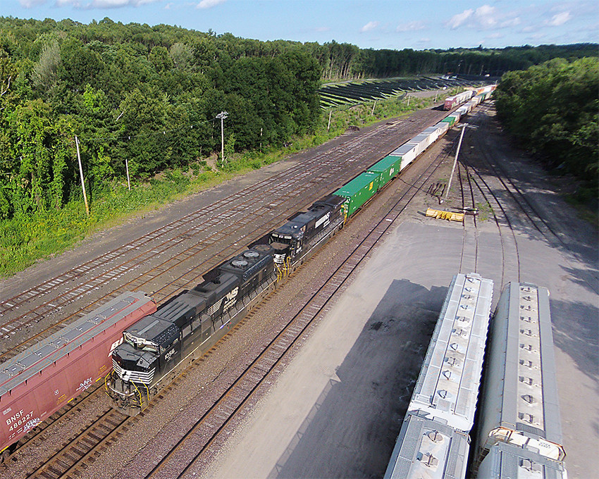 Photo of Sky Rails 2 catches 23K with NS 1056 & 8698 in Fitchburg