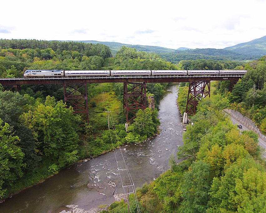 Photo of Amtrak Vermonter Xing the Sugar River Trestle in Claremont, NH