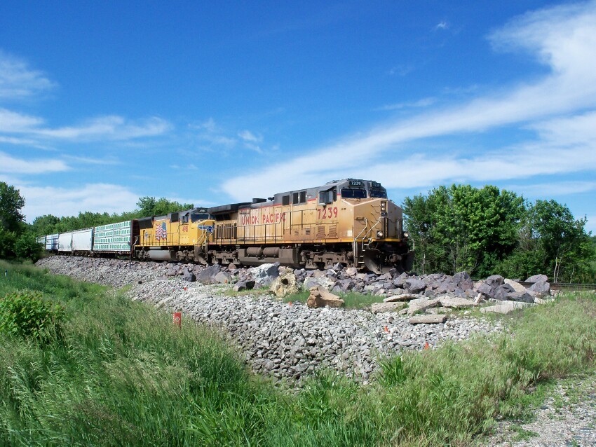 Photo of A UP Mixed Freight Train Rolling Through Cambridge, IA