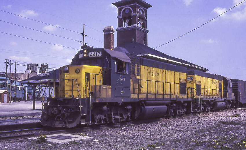Photo of CNW Freight Passing Green Bay Depot