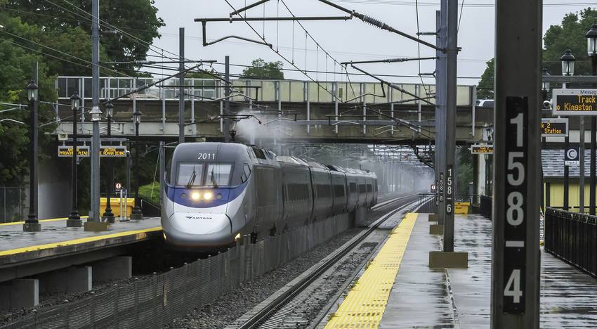 Photo of Acela Train 2167 Passing Kingston Station After a Rain Shower