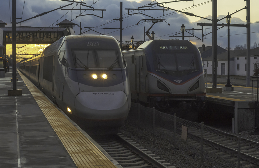 Photo of Amtrak Train 2160 Passing Stopped Train 86 At Kingston Station