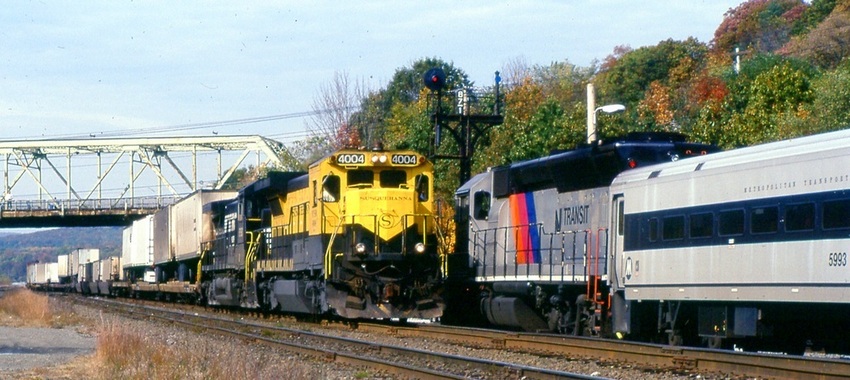 Photo of NYS&W IM train eastbound through Port Jervis