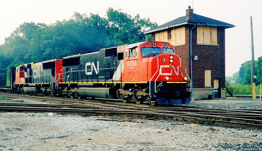 Photo of Westbound CN Manifest Crosses EJ&E at Griffith IN in 2000