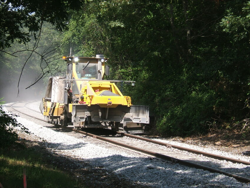 Photo of Railworks crew approaching crossing