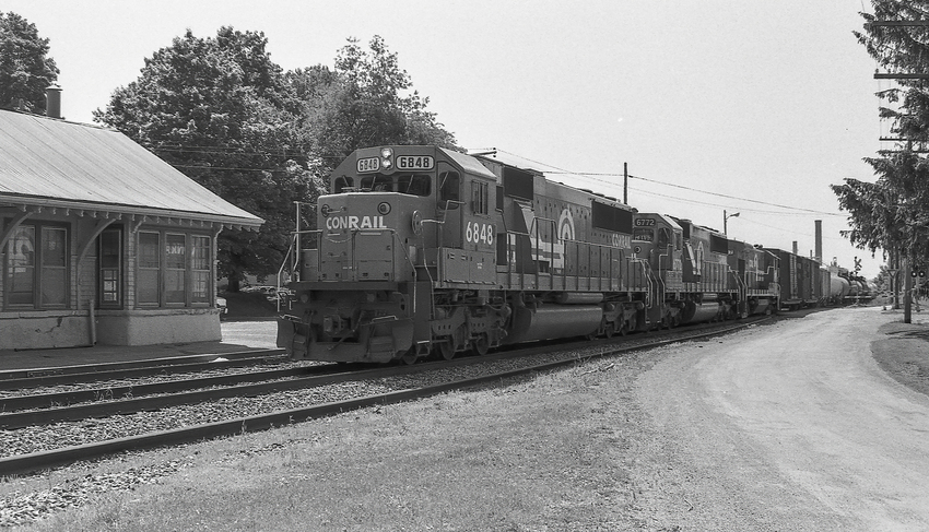Photo of Westbound Conrail Freight Passing Silver Springs, NY Depot
