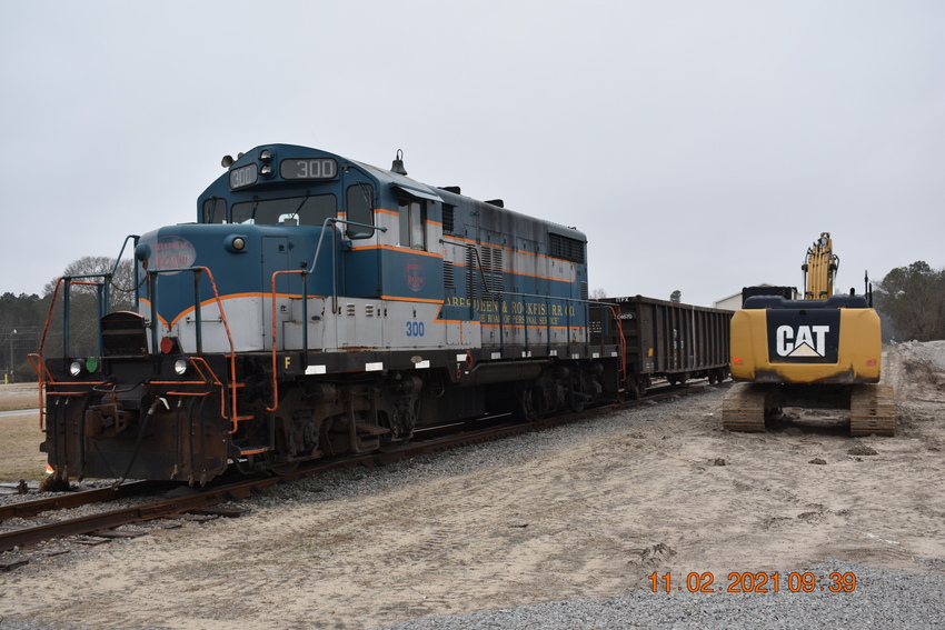 Photo of A&R GP-18 #300 sits at FCI siding in Raeford, NC