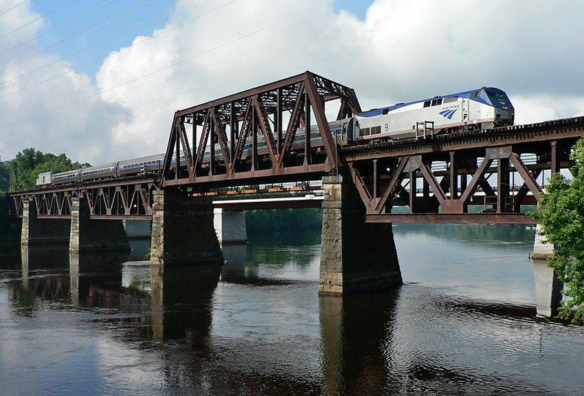 Photo of Portland-bound Downeaster crossing the Merrimack