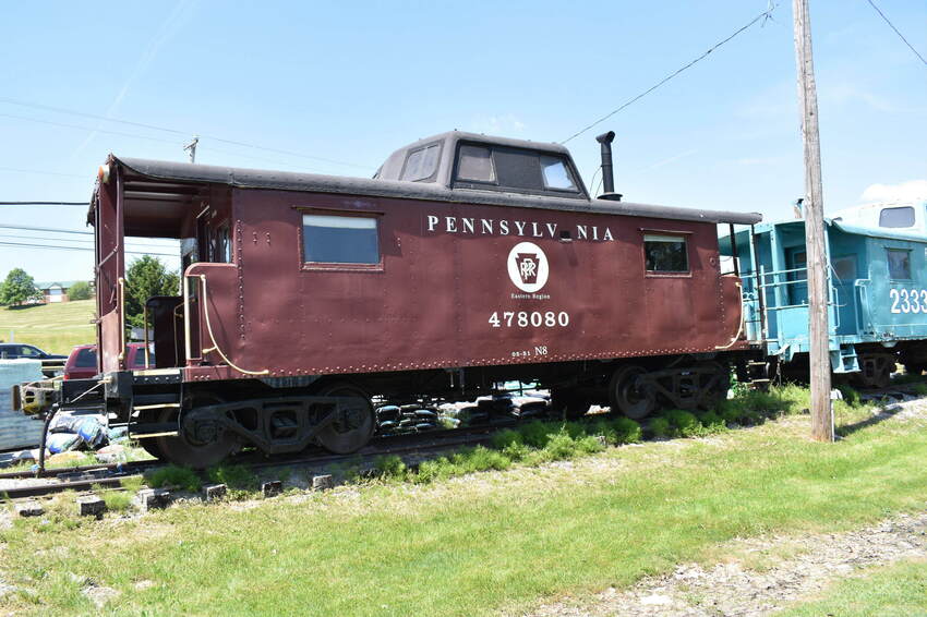 Photo of Pennsylvania RR caboose on display