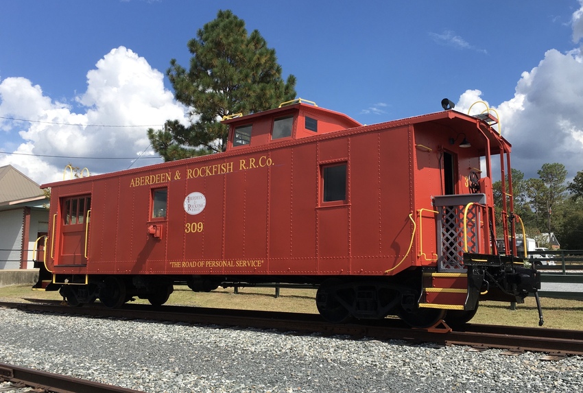 Photo of A&R caboose #309 after recent restoration.