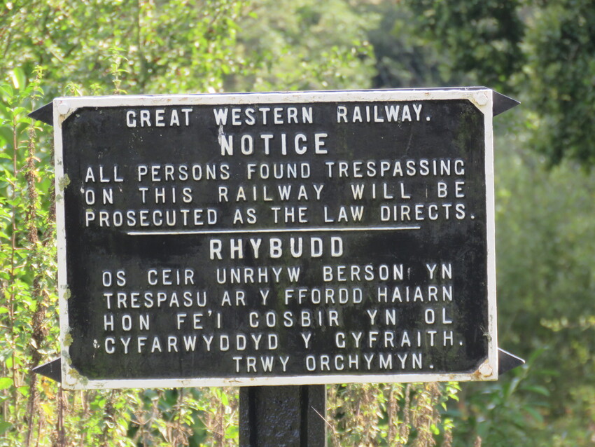 Photo of Old railway sign in two languages