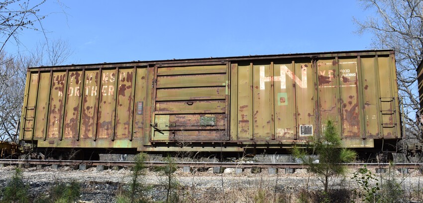 Photo of Hutchison Northern boxcar 1014 sits in the AC&W yard in Star, NC